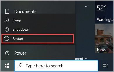 Màn hình Windows với menu Power được mở và tùy chọn Restart được chọn